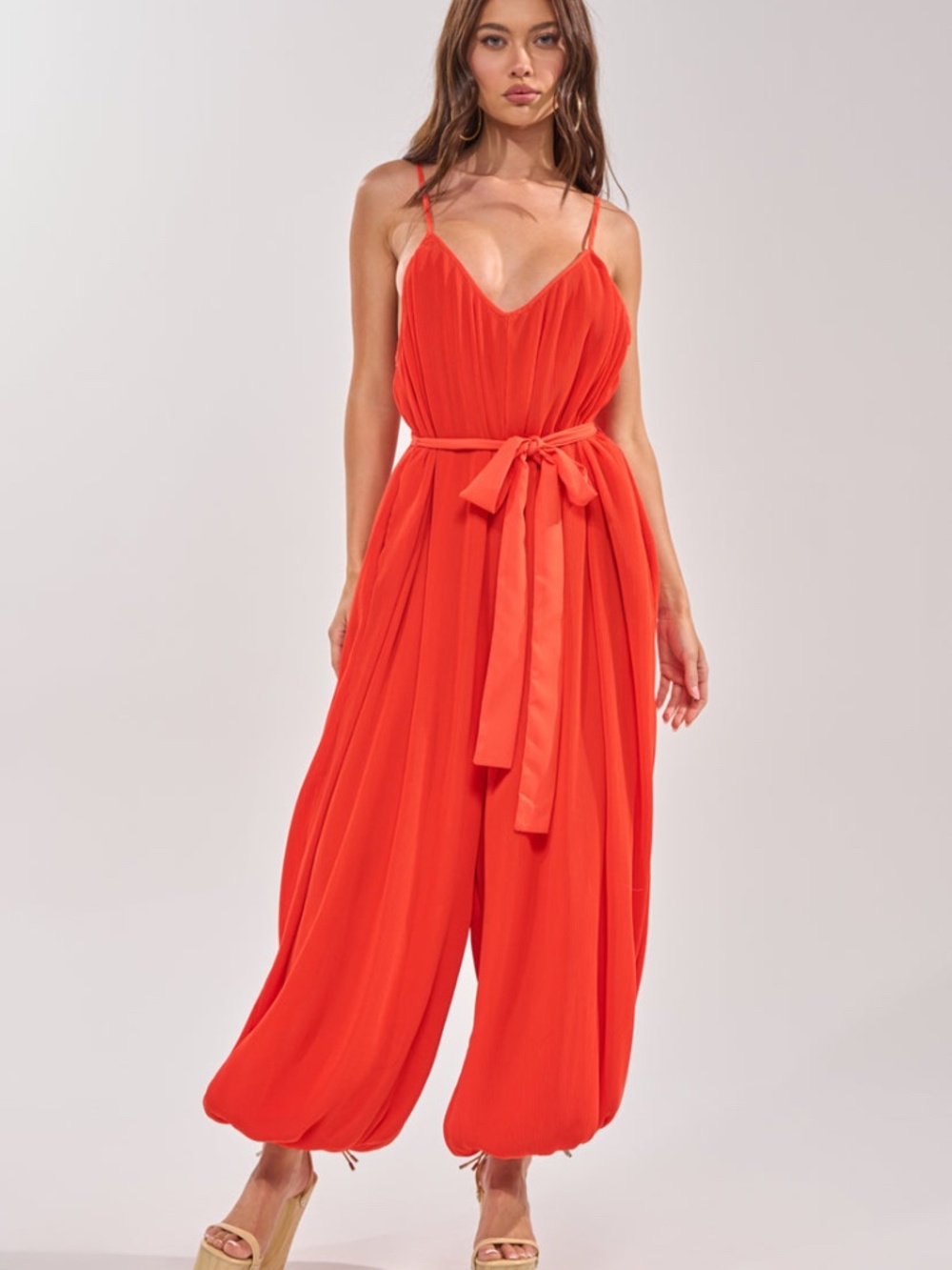 AKIRA VACATIONING PLEATED JUMPSUIT IN ORANGE Size S/MS/M